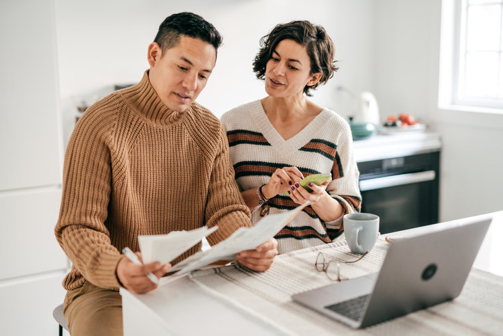 man-and-woman-doing-payroll