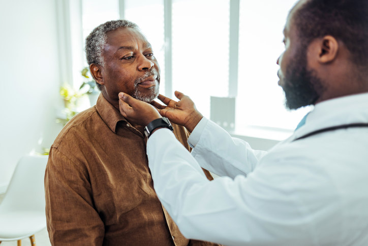 black-man-getting-checked-by-dentist