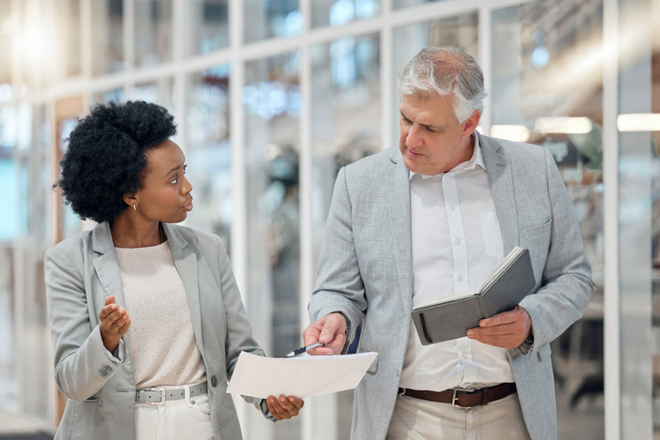 man-and-woman-discussing-employee-benefits