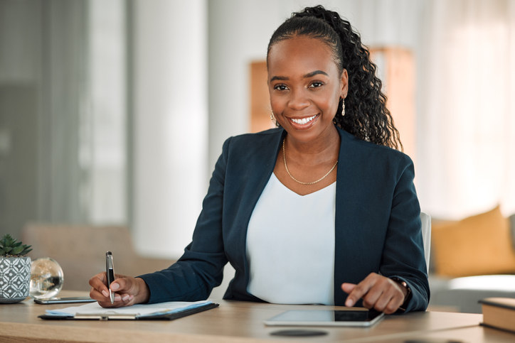 happy-employee-writing-on-paper