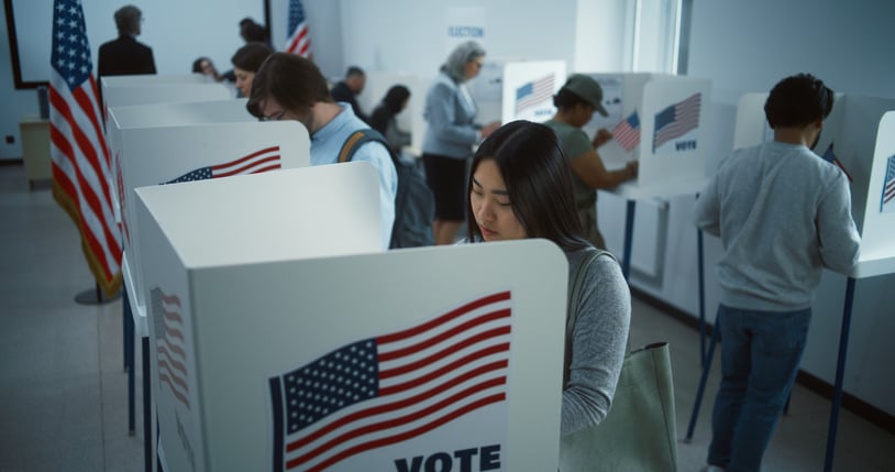 woman-voting-at-a-voting-booth