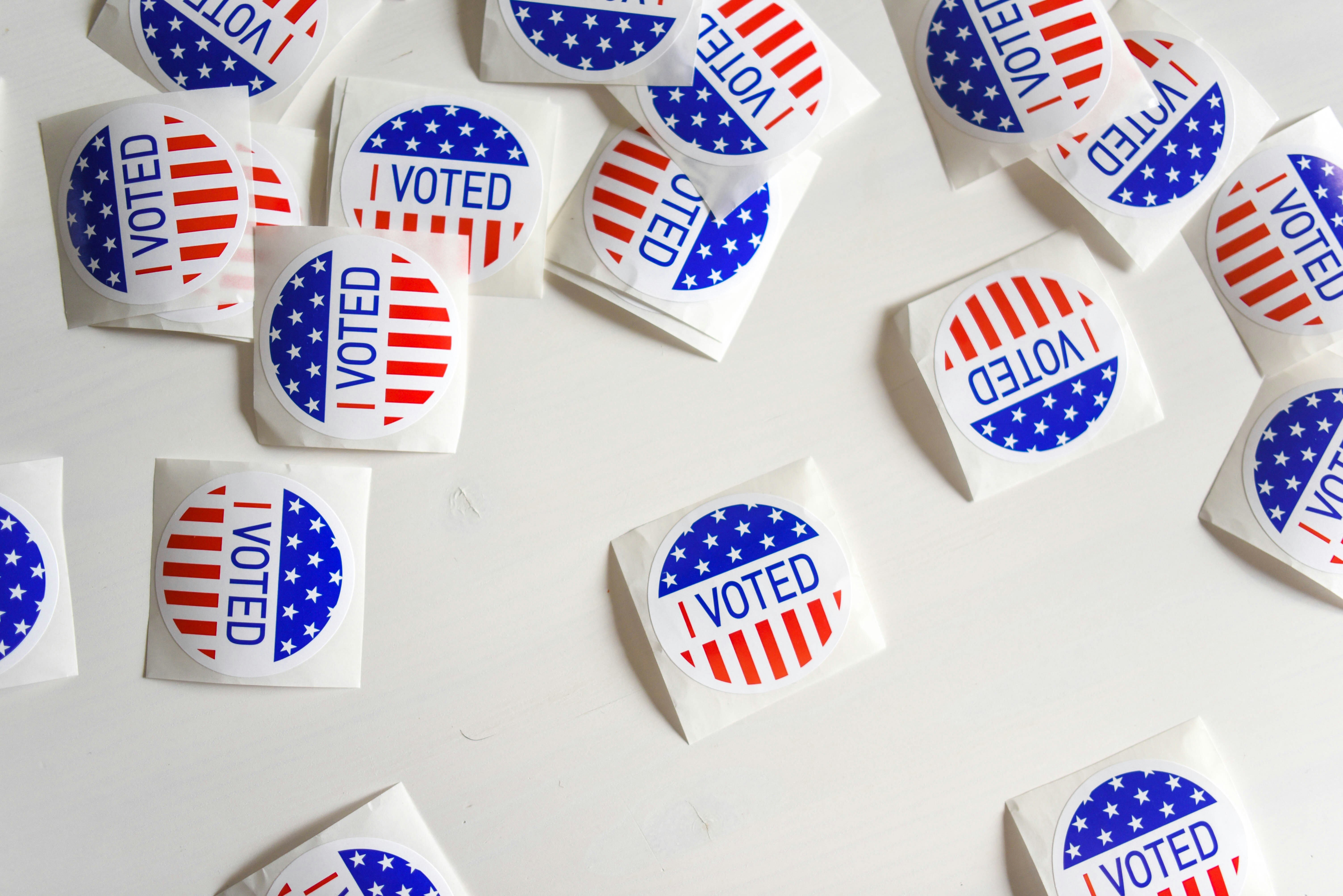 i-voted-stickers-sprawled-out-on-a-white-surface